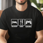 Camiseta Sleep Eat and Game Funny Gamer<br><div class="desc">Sleep Eat and Game T-Shirt - Sube tu factor de estilo porque, finalmente, la camiseta perfecta para jugadores de núcleo duro está aquí. Esta graciosa camiseta con símbolos de señas de la calle para comer y dormir, y un controlador de juegos de computadora en la tercera señal con el mensaje:...</div>