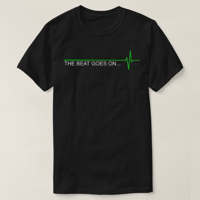 Camiseta Sobreviviente De Un Ataque Al Corazón, El Golpe Es (Diseño del anverso)