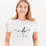 Camiseta Soltera Minimalista<br><div class="desc">La Bridesmaid Minimalista Bachelorette T-Shirt es una elección elegante y moderna para tu fiesta nupcial, con un sencillo diseño negro con un elegante guión "I Do". Con su estilo minimalista y su sutil acento diamantítico, esta camisa es perfecta para celebraciones de soltera o como un regalo meditado para la fiesta...</div>
