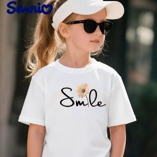 Camiseta Sonriente con Gráfico de Flor y Letras a