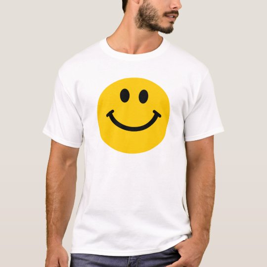 Camiseta sonriente feliz amarilla de la cara