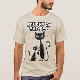 Camiseta Sonrisas incómodas: Gatito negro con su cómica com