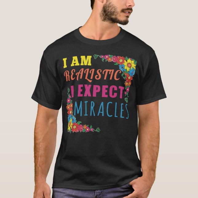Camiseta Soy realista. Espero milagros (Anverso)