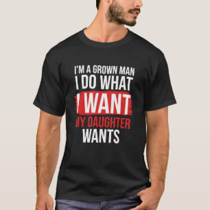 Camiseta Soy un hombre adulto hago lo que mi hija quiere di