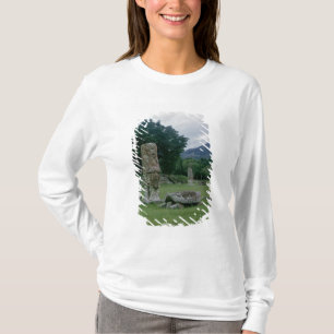 Camiseta Stele en parte del campo cercana a la red de la