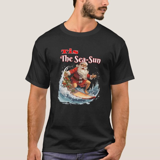 Camiseta Surfing Santa Claus Tis The Sea Sun Premium (Anverso)
