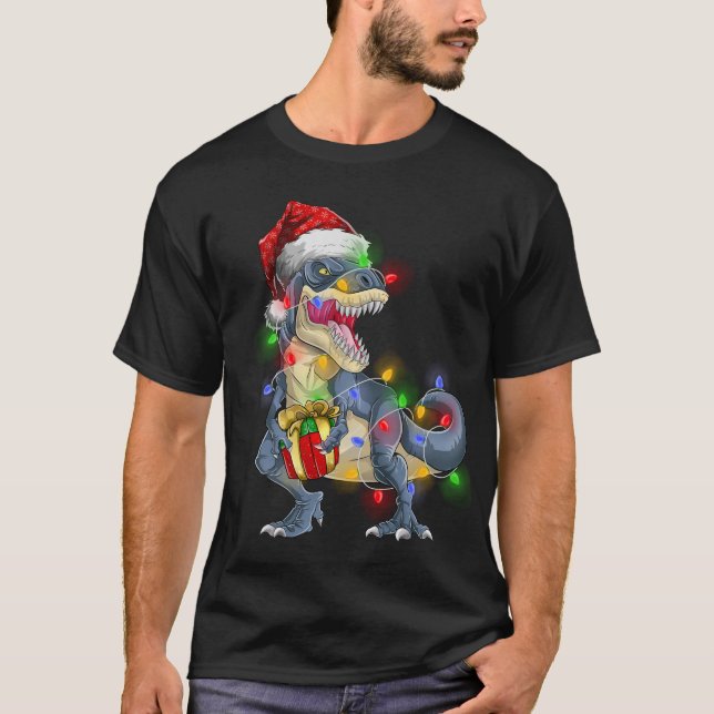 Camiseta T Rex Dinosaur Merry Christmas Luce Santa Hat (Anverso)