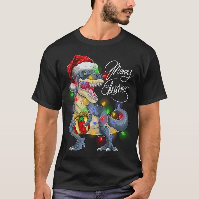 Camiseta T Rex Dinosaur Merry Christmas Luce Santa Hat (Anverso)