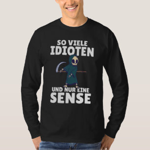 Camiseta Tantos idiotas y solo un pedazo de humor negro 1