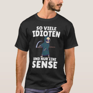 Camiseta Tantos idiotas y solo un pedazo de humor negro 1