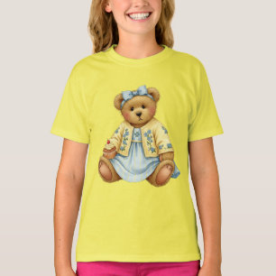 Camiseta Teddy con un vestido de lino azul con un pastel