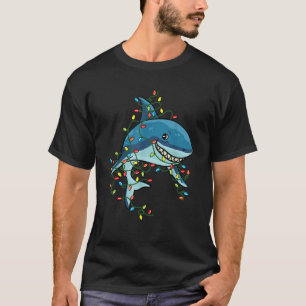 Camiseta Tiburón enredado en Navidades enciende regalo