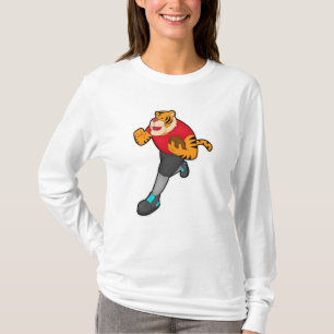 Camiseta Tigre como jugador de fútbol con fútbol