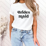 Camiseta Tipografía simple retro boho | Noviaria<br><div class="desc">Esta sencilla y moderna camiseta muestra la palabra "dama de honor" en una tipografía retro negra,  junto con un espacio para su nombre,  y es el regalo perfecto para los miembros de su fiesta nupcial.</div>