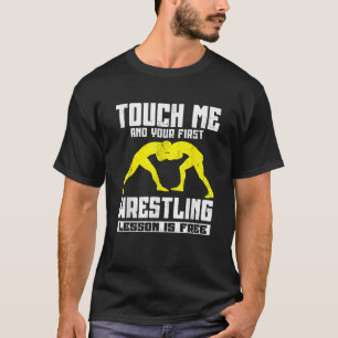 Camiseta Tócame y tu primera lección de lucha libre es grat