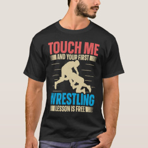 Camiseta Tócame y tu primera lección de lucha libre es grat