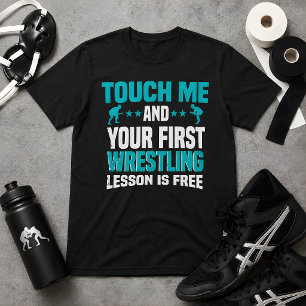 Camiseta Tócame y tu primera lección de lucha libre es grat