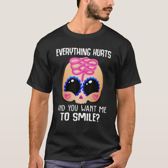 Camiseta Todo Duele Y Quieres Que Sonría Basura. (Anverso)