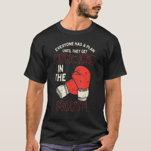 Camiseta Todo El Mundo Tiene Un Plan Hasta Que Se Los Empuj