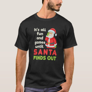 Camiseta Todo es diversión y juegos hasta que Santa descubr