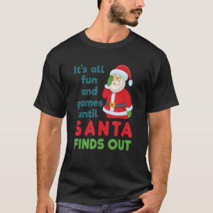 Camiseta Todo es diversión y juegos hasta que Santa descubr