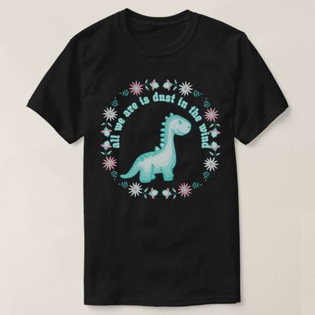 Camiseta Todo Lo Que Dinosaurios Somos Es Polvo En El Vient (Diseño del anverso)