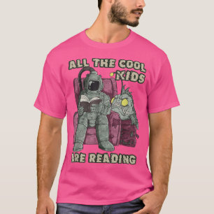 Camiseta Todos los niños geniales están leyendo libros leye
