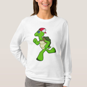 Camiseta Tortuga como corredora con gorra