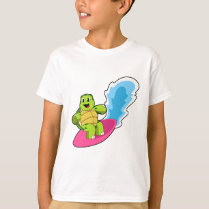 Camiseta Tortuga como surfista con tabla de surf