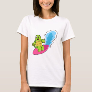 Camiseta Tortuga como surfista con tabla de surf