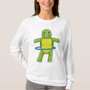 Camiseta Tortuga en gimnasio con neumáticos Fitness