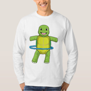 Camiseta Tortuga en gimnasio con neumáticos Fitness