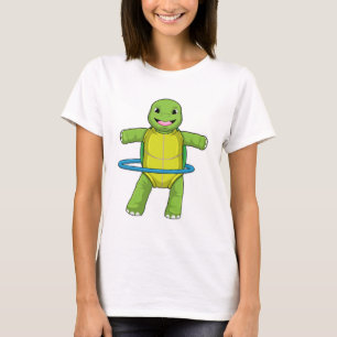Camiseta Tortuga en gimnasio con neumáticos Fitness