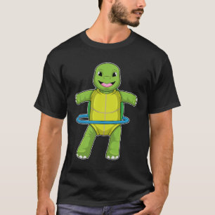 Camiseta Tortuga en gimnasio con neumáticos Fitness