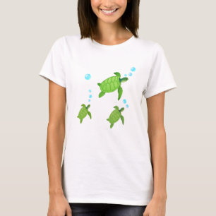 Camiseta tortugas marinas nadando verdes