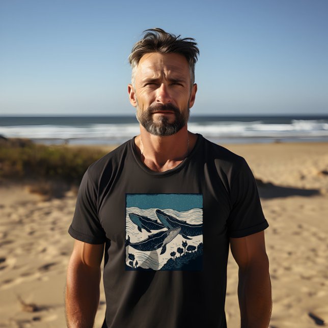 Camiseta Tres ballenas azules, negrita impresa en negro de  (A bold print of three blue whales under the sea on a men's black t-shirt, perfect for animal lovers.)