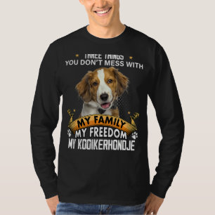 Camiseta Tres cosas que no se mezclan con el perro Kooikerh