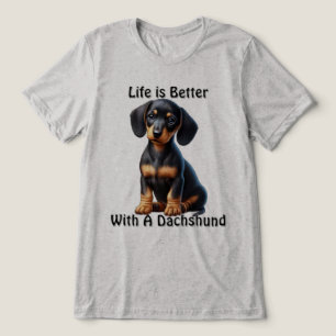 Camiseta Triblenda Cachorro de Dachshund sentado y mirando con inocen