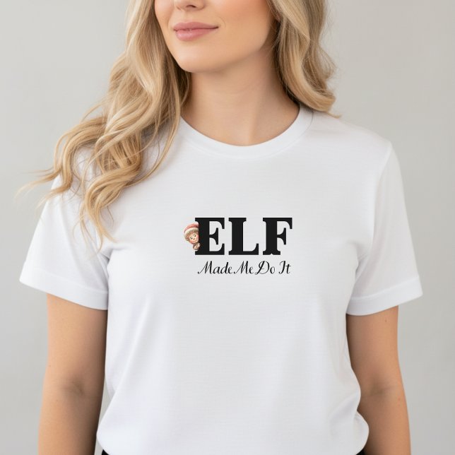 Camiseta Triblenda Elf Made Me Do It Christmas T-Shirt (White t-shirt with black text “Elf Made Me Do It” and small elf hat illustration)