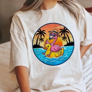Camiseta Triblenda Flamenco montando pato de goma Atardecer tropical 