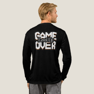 Camiseta Triblenda Game Over, Level Up: Mundo de Juegos Retro Pixelad