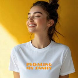 Camiseta Triblenda Ironía de chica en bicicleta naranja