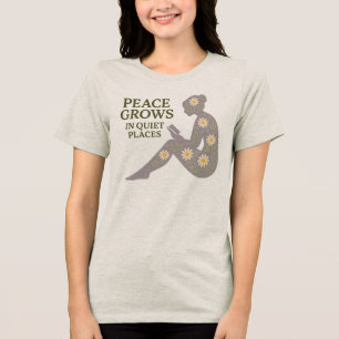 Camiseta Triblenda La paz crece en lugares tranquilos, silueta floral