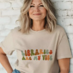 Camiseta Triblenda Las Bibliotecas Retro Groovy son mi opinión, bibli<br><div class="desc">Camiseta de estilo retro "Las bibliotecas son mi vibe",  para bibliotecarios,  archiveros y asistentes de biblioteca.</div>