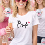 Camiseta Triblenda Minimalist Bride Bridal Shower & Bachelorette<br><div class="desc">Celebrate your special moment in timeless style with this elegant “The Bride” t-shirt. Featuring a clean, minimalist script with a subtle heart accent, this design is perfect for brides who want a chic and effortless look for their wedding festivities. Whether you're heading to your bachelorette party, bridal shower, or getting...</div>