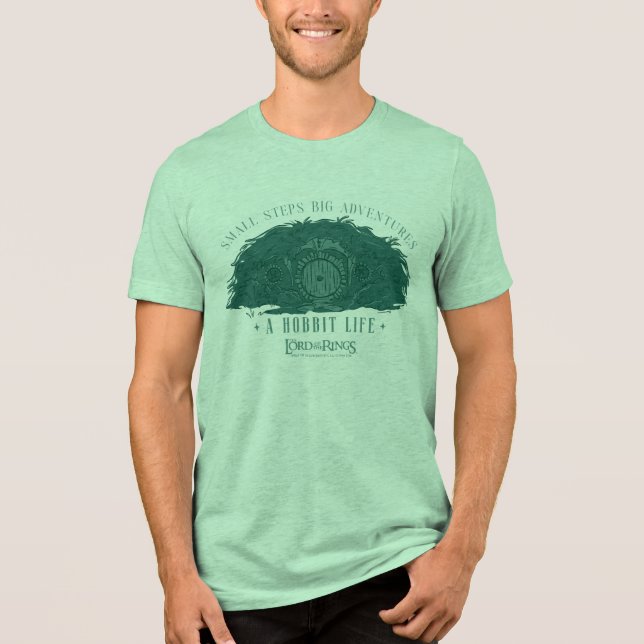 Camiseta Triblenda Pequeños Pasos, Grandes Aventuras - Una Vida Hobbi (Anverso)