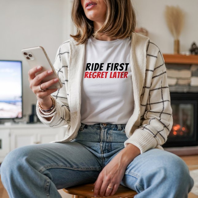 Camiseta Triblenda Retro bike Girl Irony red black (Accompanying the bike graphic is a fun and playful saying: "Ride First, Regret Later.")