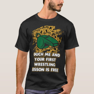 Camiseta Tu primera lección de lucha libre es cacao libre