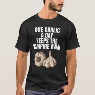 Camiseta Un ajo al día mantiene al vampiro alejado como un 