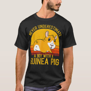Camiseta Un cerdo guineano nunca subestima a un niño con un